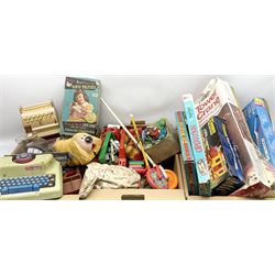 Quantity of vintage and later toys to include Palitoy hand puppet doll in box, Mettoy toy typewriter, boxed games etc in three boxes
