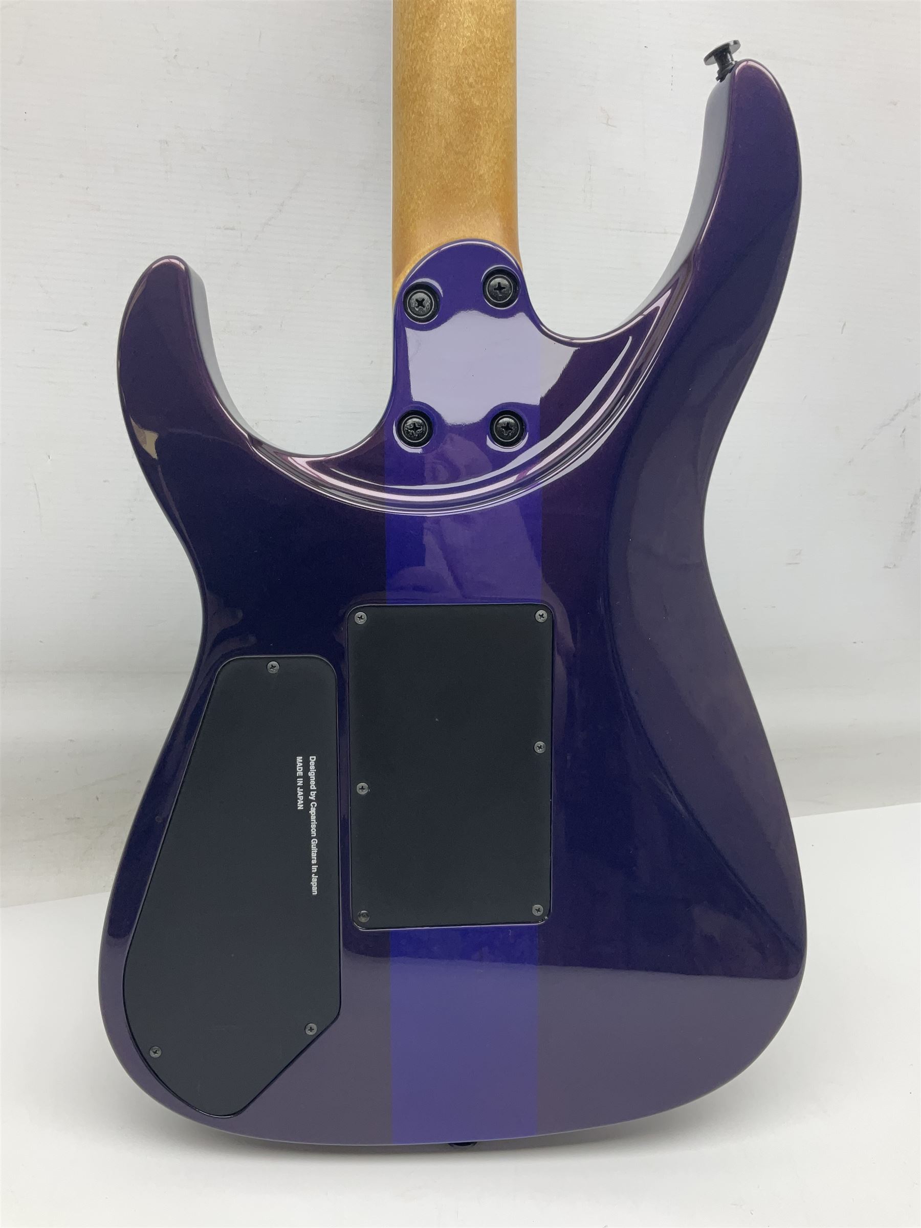 2015 Japanese Caparison Dellinger Prominence hand made boutique rock guitar in spectrum blue with clock inlays and Scaller tremolo; serial no.3200018; L100cm; in fitted case with certificate, registration card, tools etc