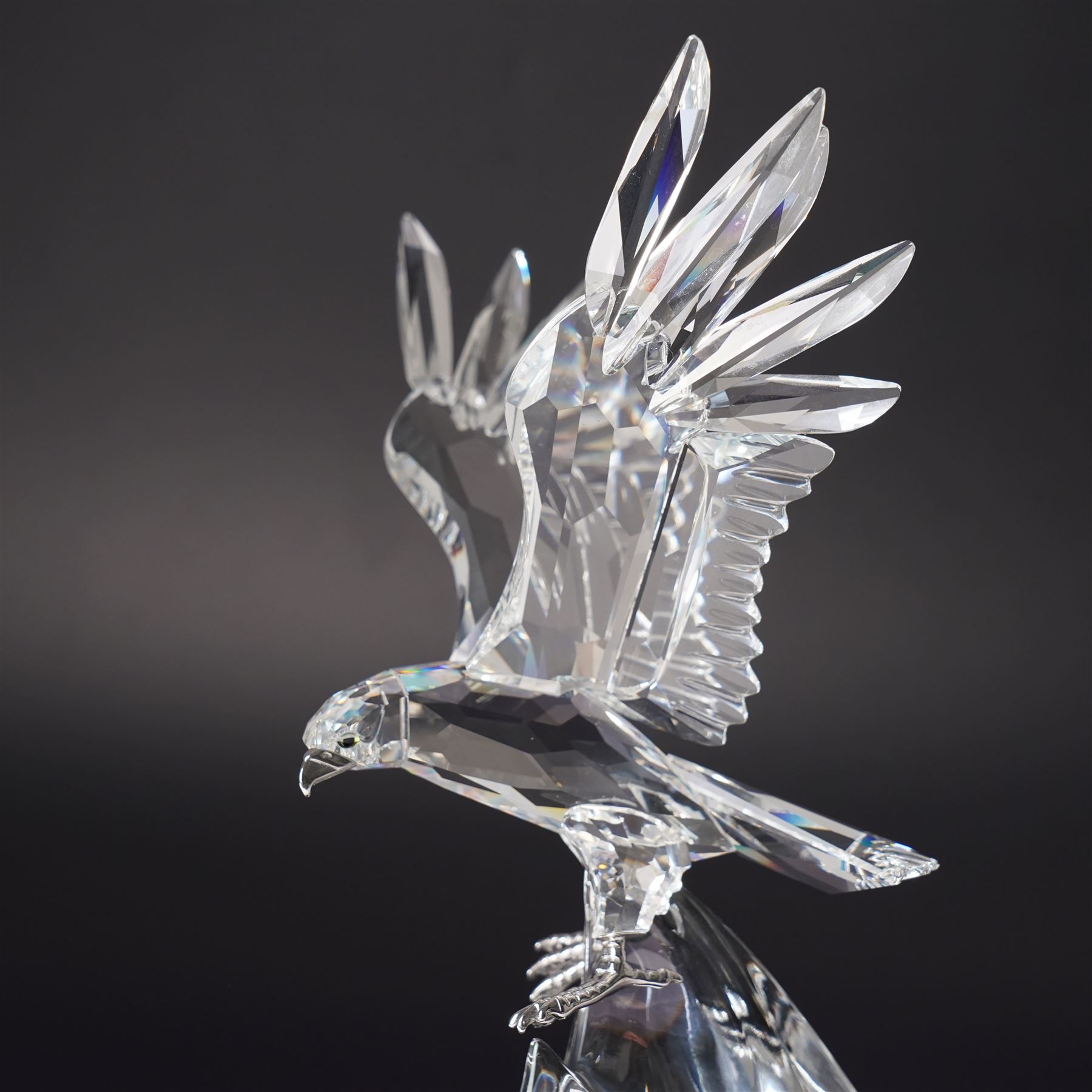 Swarovski, The Eagle, modelled as an eagle in flight upon a wooden base, limited edition 7515/10000, with certificate and case