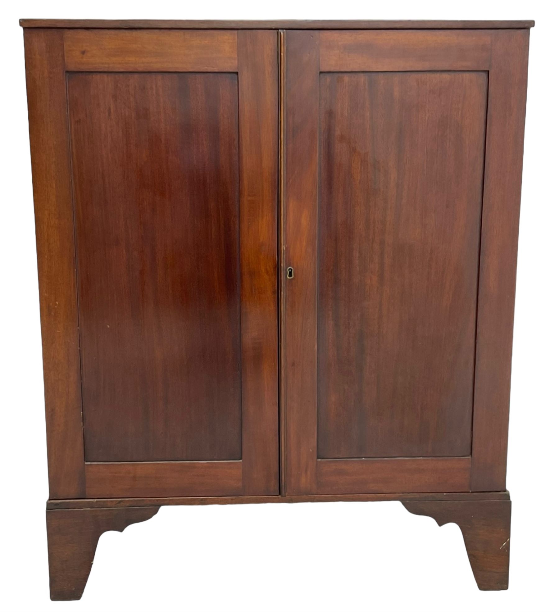 19th century mahogany collector's cabinet, crossbanded rectangular top over two panelled doors, the interior fitted with seven shallow drawers, on bracket feet