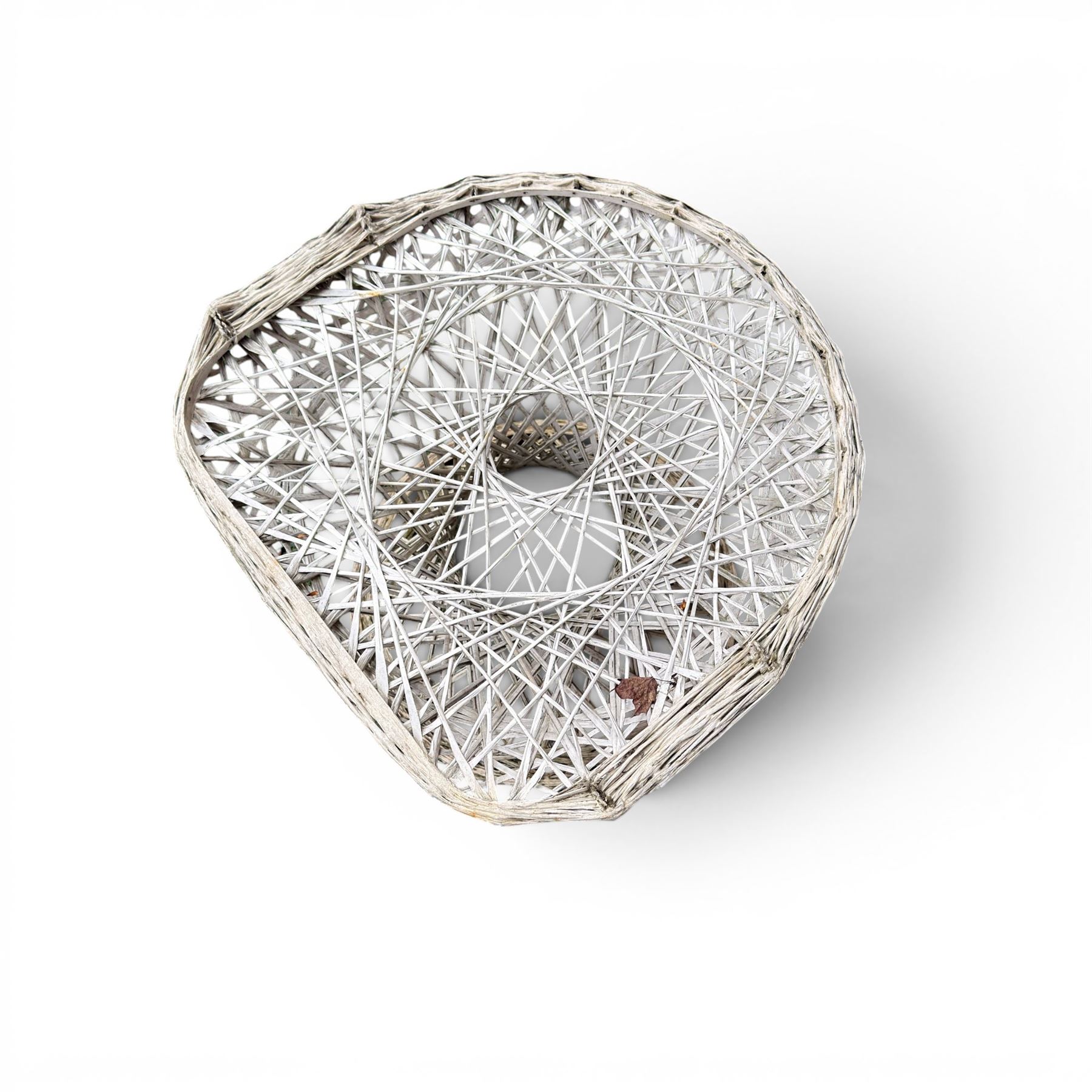 Two French early 20th century painted wicker octagonal garden tables, circular pedestals with parasol opening; with matching side table (3)