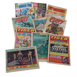 Collection of vintage comics and magazines, including Shoot, Tiger, Action, etc