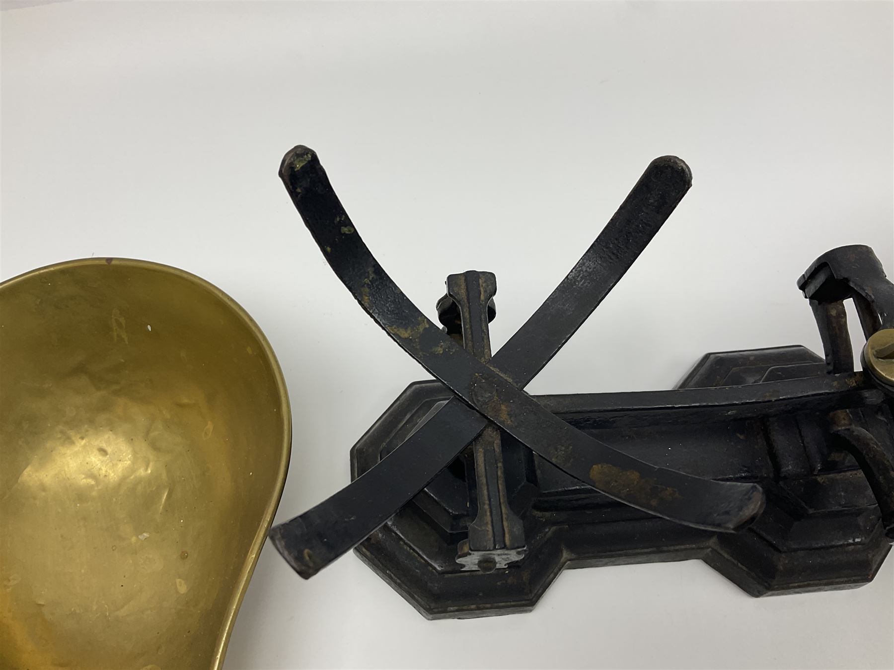 Black painted and brass kitchen balance scales with graduated set of brass weights