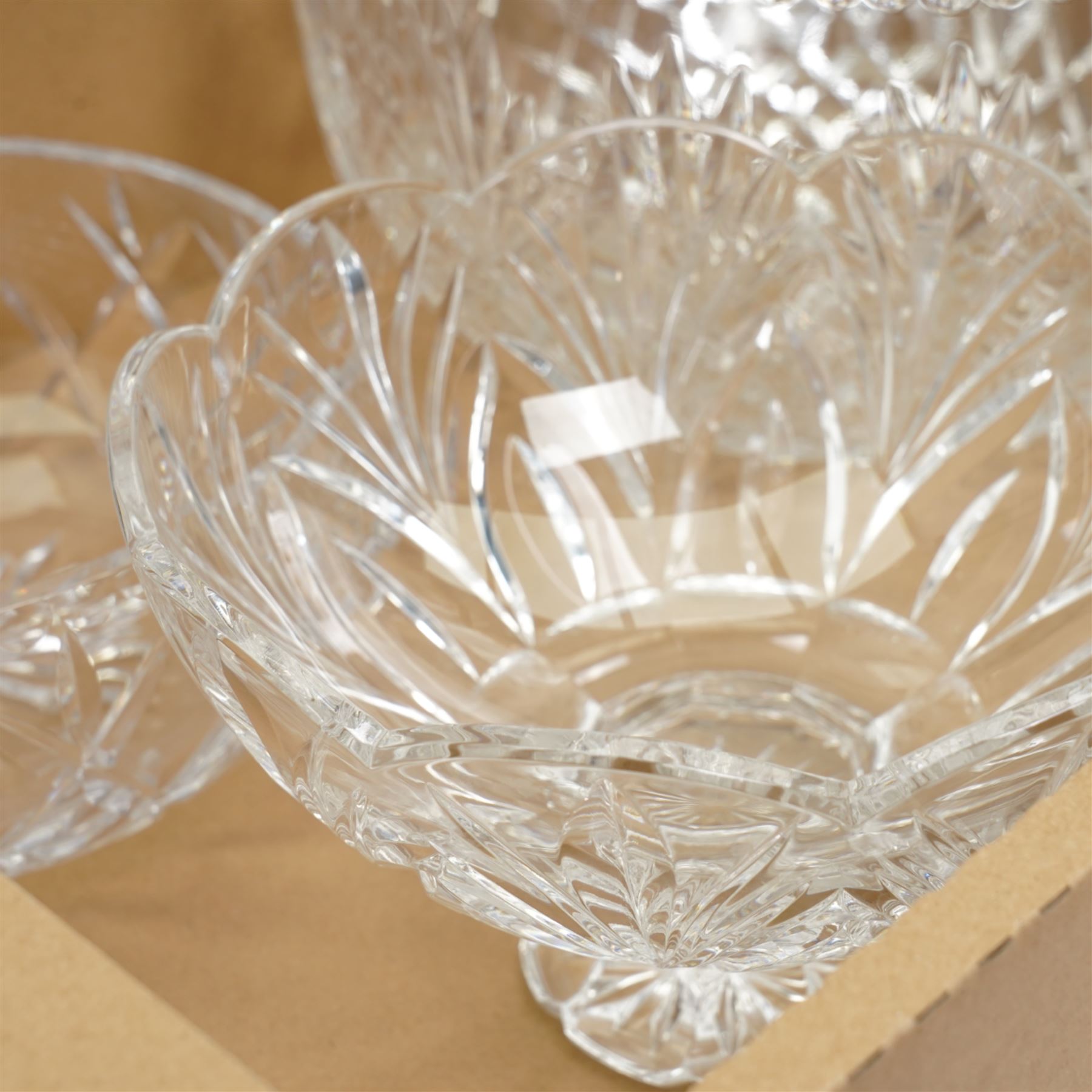 A Marquis by Waterford cut glass pedestal fruit bowl, decorated in the Canterbury pattern, together with two other crystal bowls, unmarked, largest H16.5cm (3)
