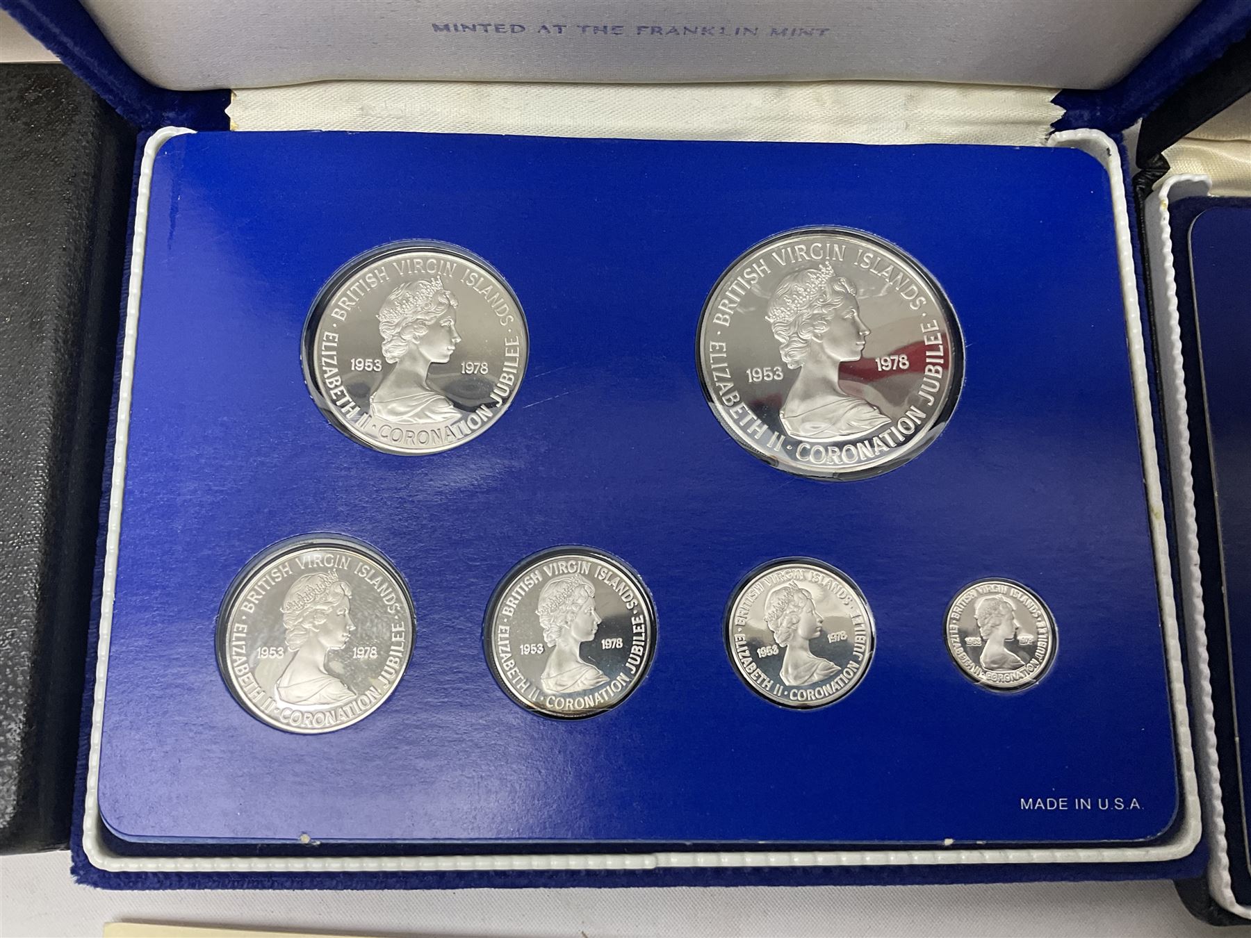 Four British Virgin Islands proof coin sets, comprising First Coinage of the British Virgin Islands 1973 proof six coin set, containing silver one dollar coin, 1977 and 1979 proof sets, containing high denomination silver coins, and The Royal Coronation Jubilee 1977 six coin silver proof set, each minted at the Franklin Mint, all cased with certificates, and a Solomon Islands 1978 proof seven coin set, containing silver five dollar coin, minted at the Franklin Mint, cased with certificate (5)