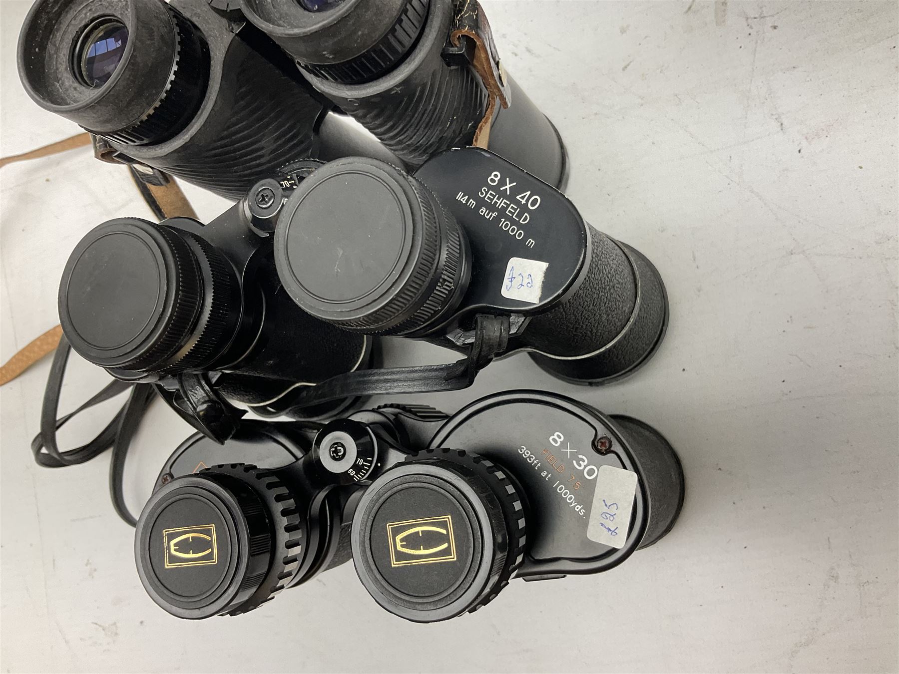 Eleven cased pairs of binoculars to include Summit 8x30,  Concord 8x40, Tasco no. 106 8x - 16x40, Chinon 10x50, Tokina 7x42 Field, Zoom 6x- 12x32 etc