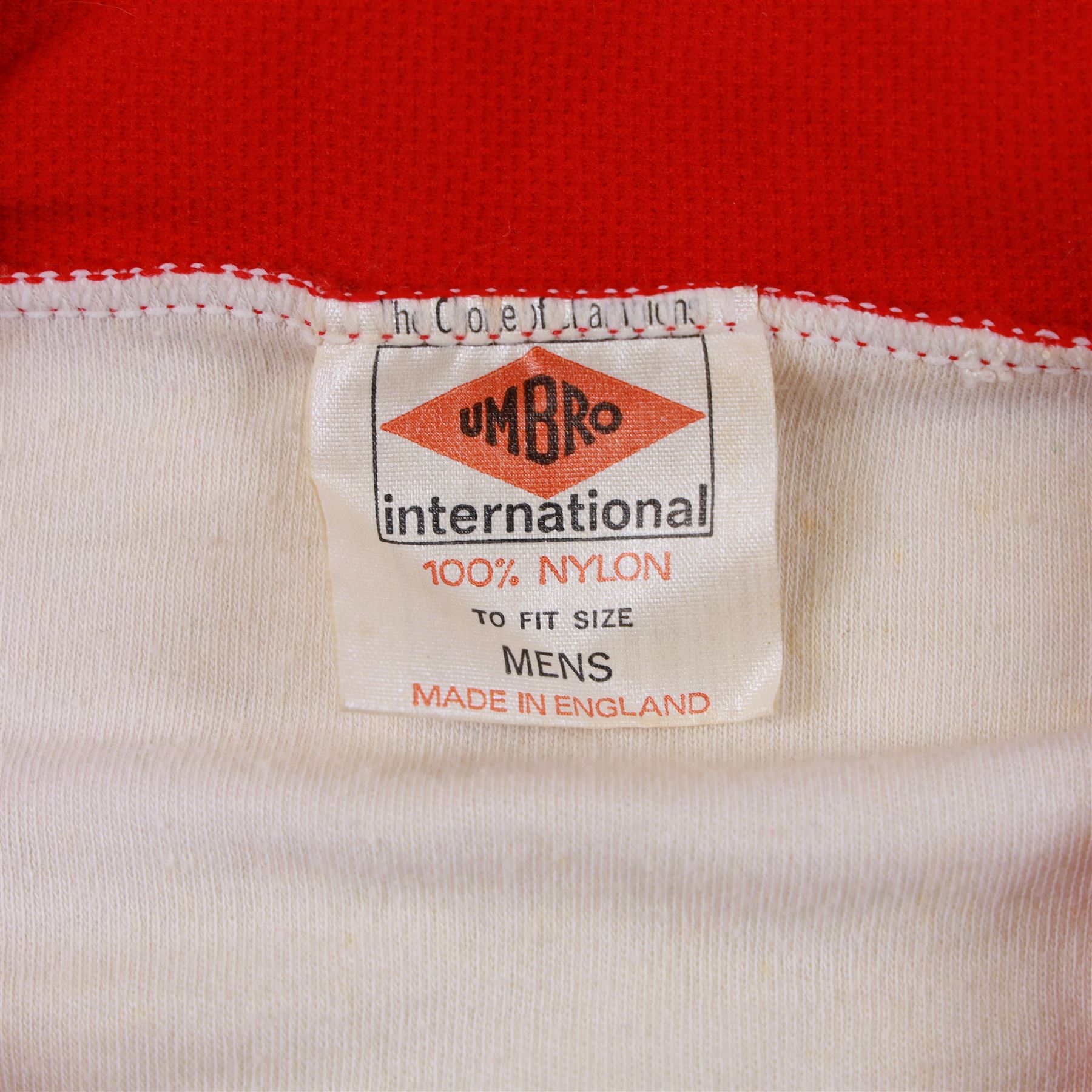 1960s Scarborough FC long sleeved football shirt, all white with red cuffs and collar, red umbro logo, stitched red SFC logo and red number 13 to back, with Umbro International label inside collar