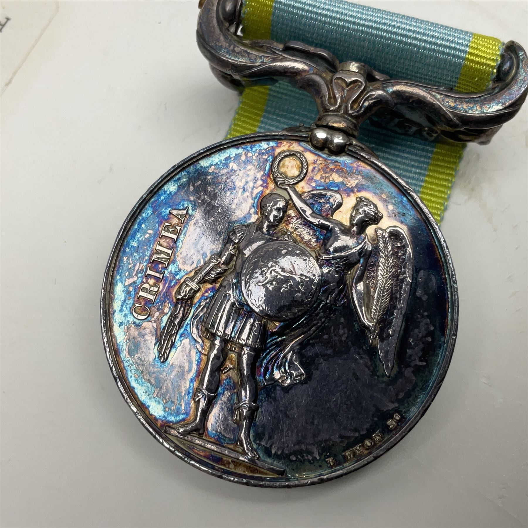 Victoria Crimea Medal with Sebastopol clasp awarded to G. Chammings H.M.S. Valorous; and a Turkish Crimea Medal, marked La Crimea 1855; both with later ribbons but original ribbons included (2)