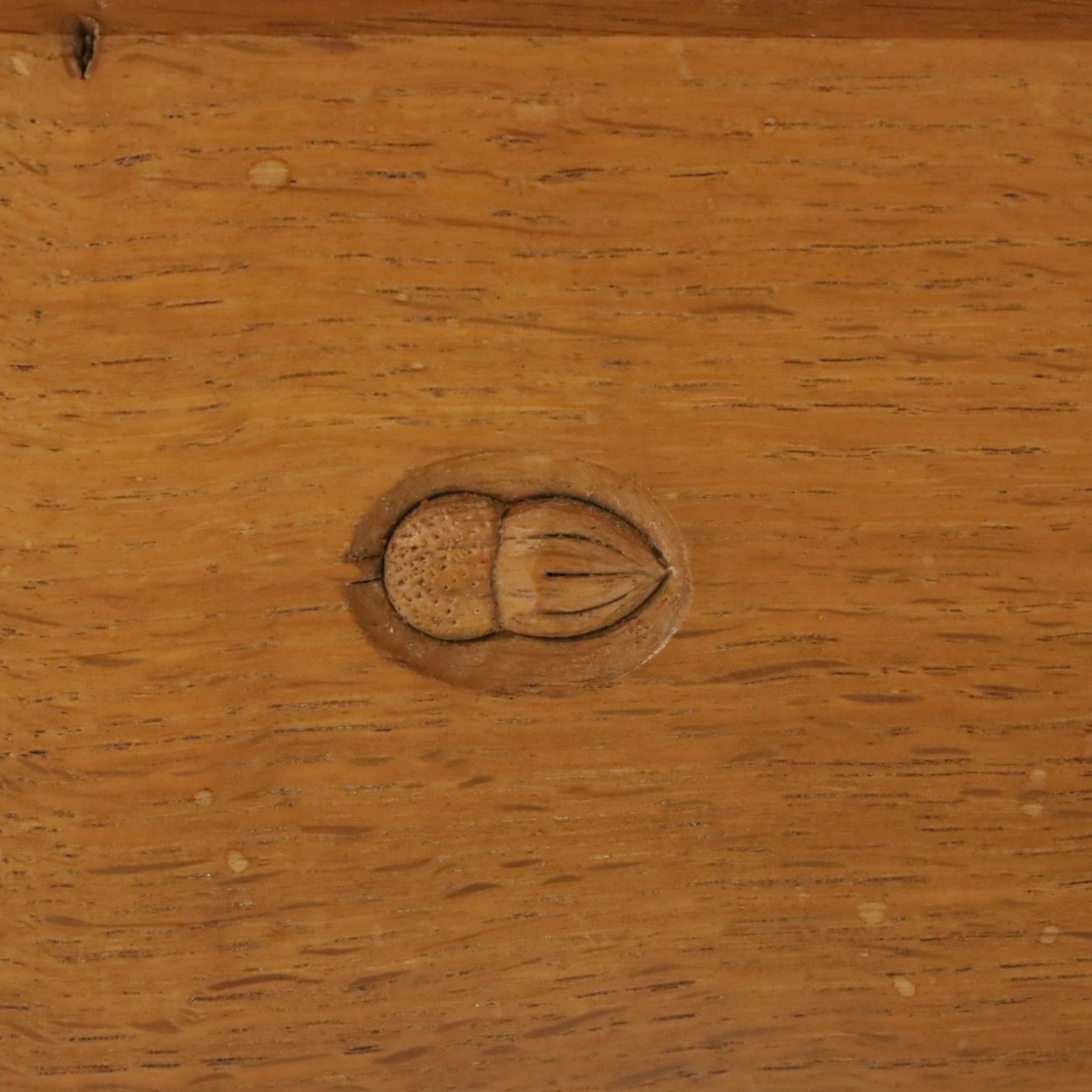 Acorn Industries - oak dining table, rectangular top with rounded corners and chamfered edge, raised on twin lyre-shaped supports united by pegged stretched on sledge feet, carved with acorn signature to stretcher, by Alan Grainger, Brandsby
