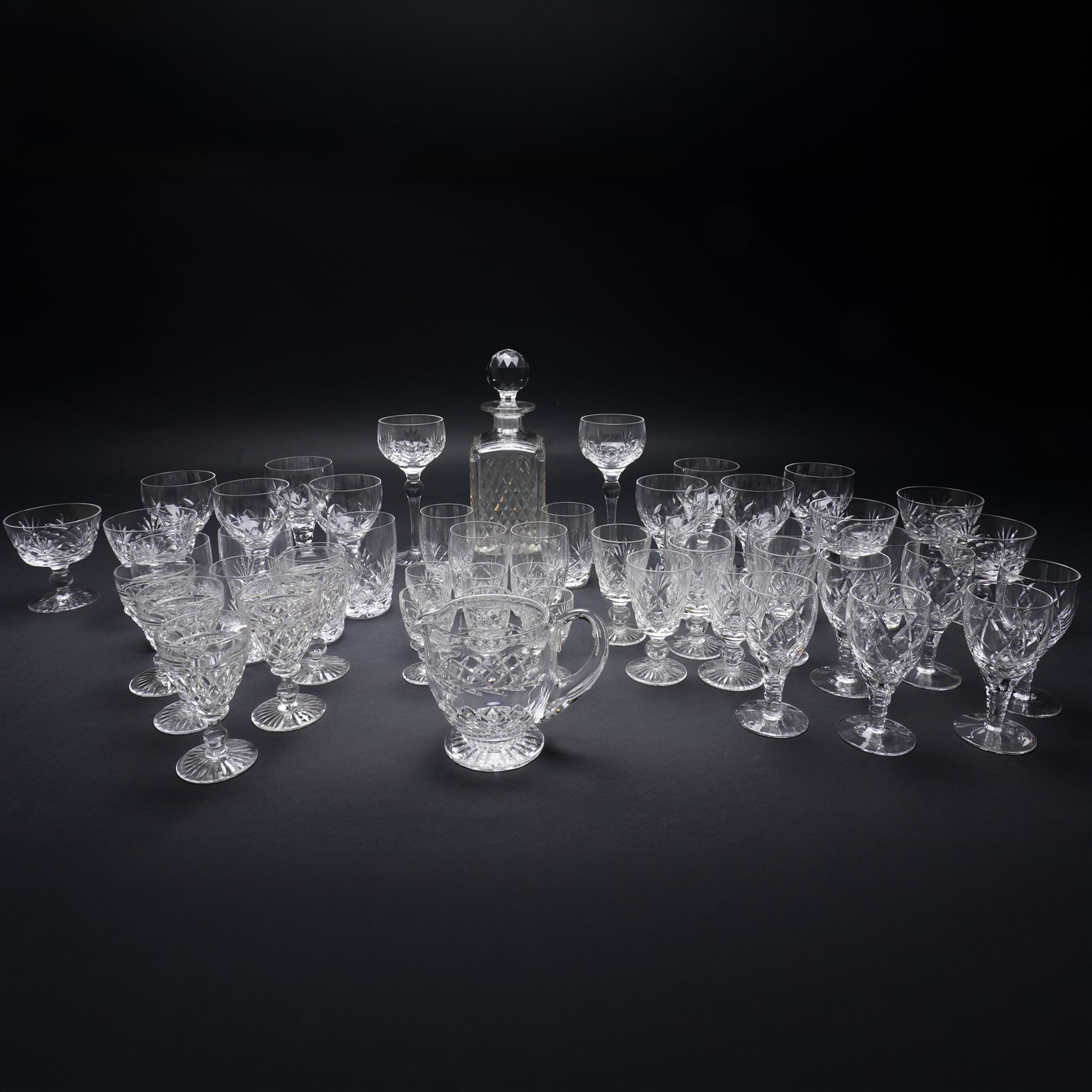 Collection of Stuart 'Ludlow' and 'Carlingford' pattern table glass including claret and hock glasses, tumblers, sherry glasses, etc together with a hobnail cut decanter etc