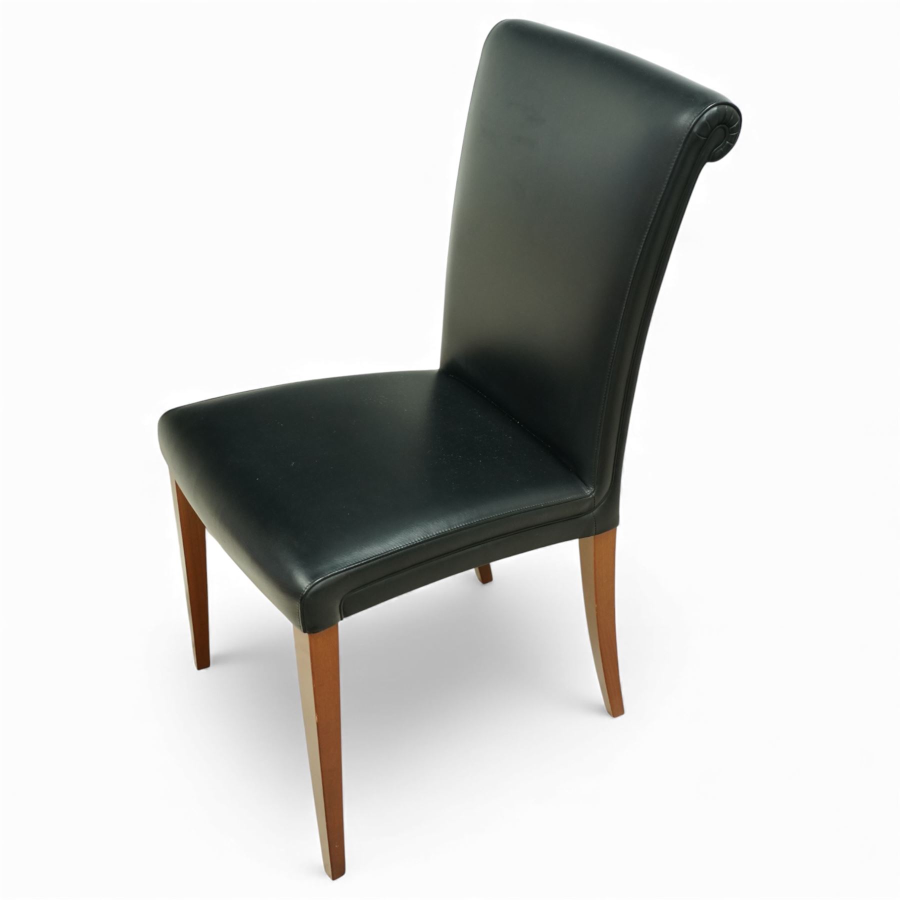 Poltrona Frau - set of eight ‘Vittoria’ dining chairs, each upholstered in black Pelle Frau leather with rolled top-cresting backs and saddle-stitched seams, raised on tapering stained beech supports