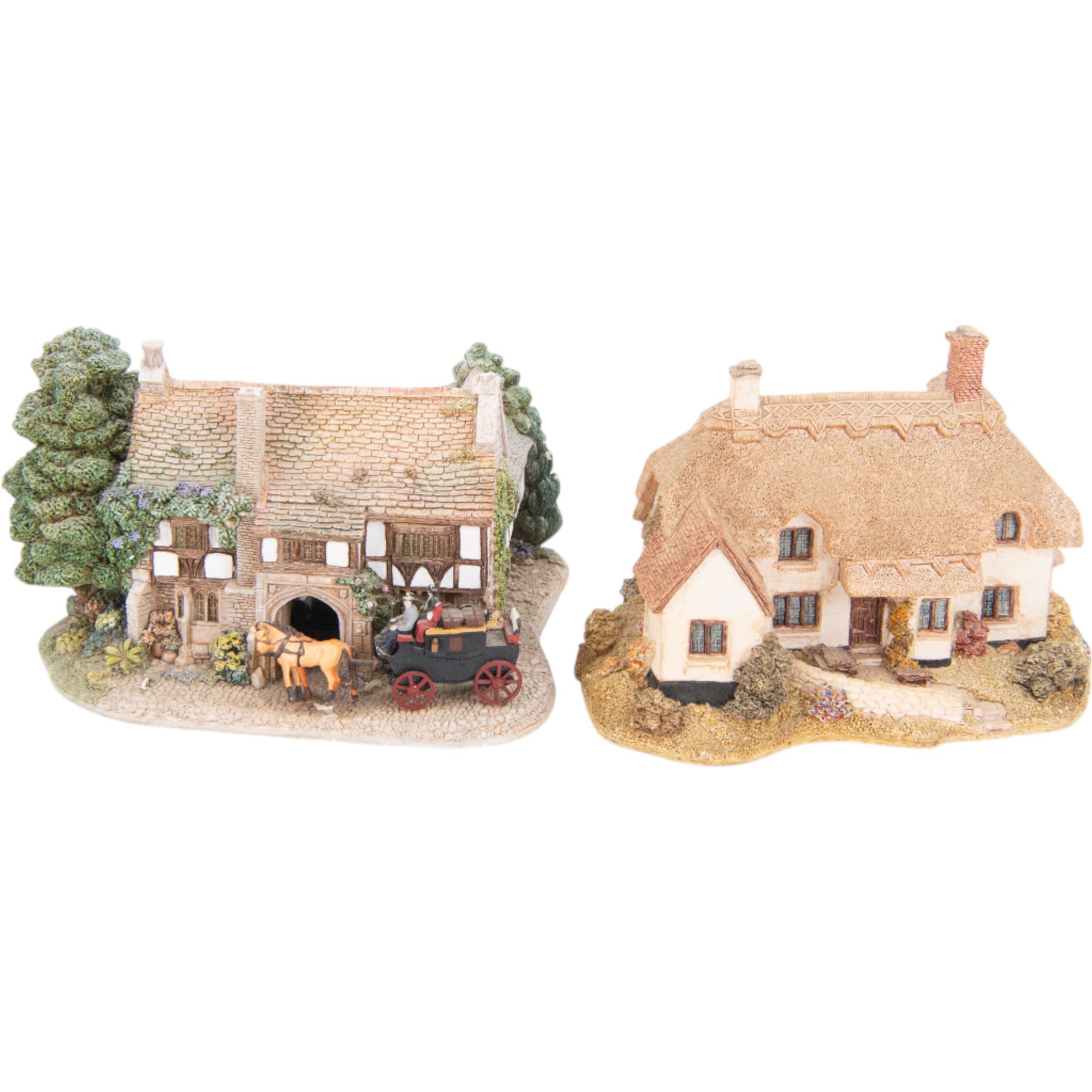 Eight Lilliput Lane models, comprising Heritage Collection Buckingham Palace, Crown Inn, Anne Hathaway, Periwinkle Cottage, Royal Oak Inn, Through The Keyhole, Burley Street Garage and The George Inn