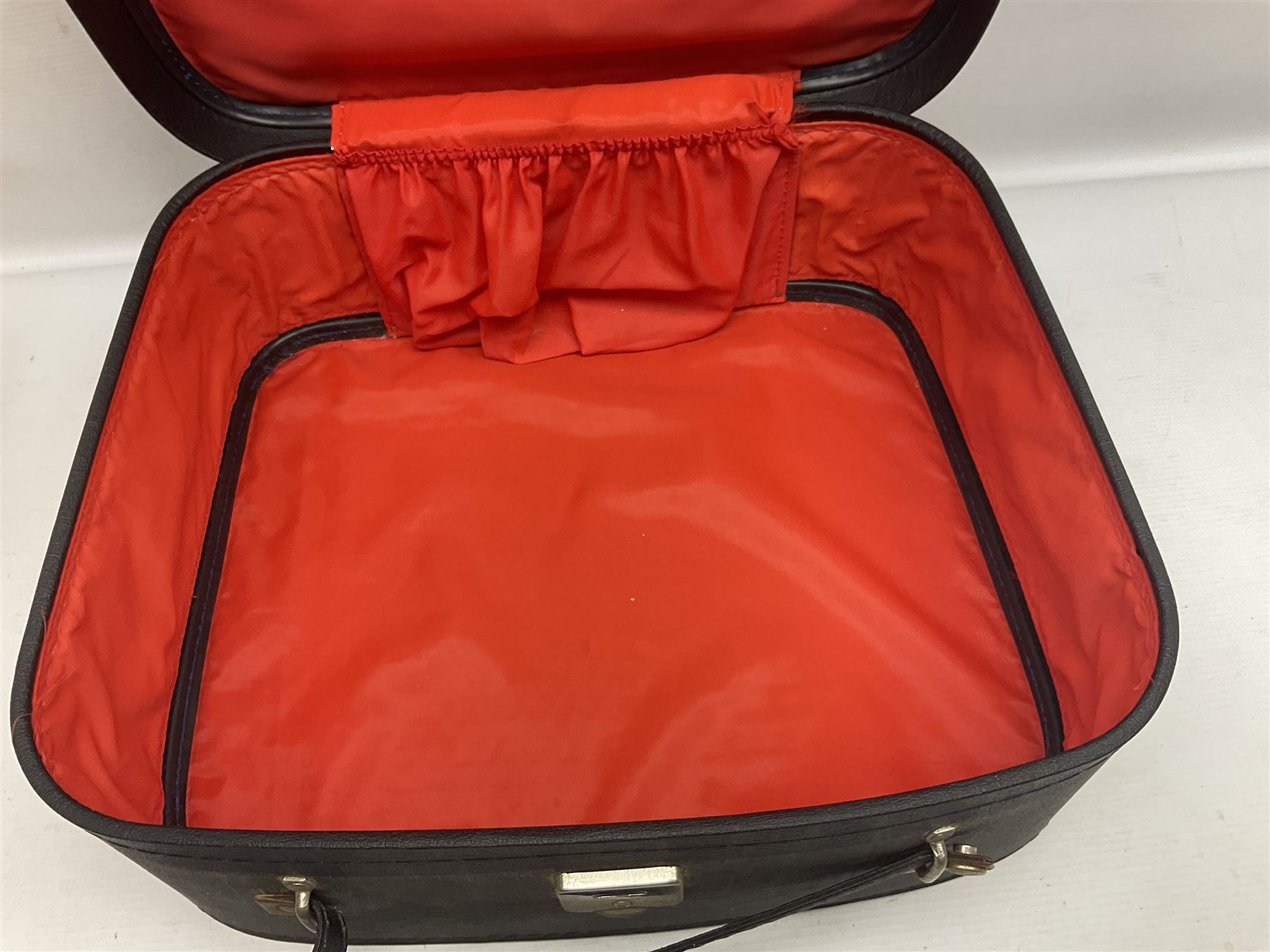 Brass oil lamp, with etched floral glass shade, leather Gladstone style doctors bag, leather satchel and vintage vanity case, three graduating wooden giraffes and other wood and metal ware, lamp H54cm