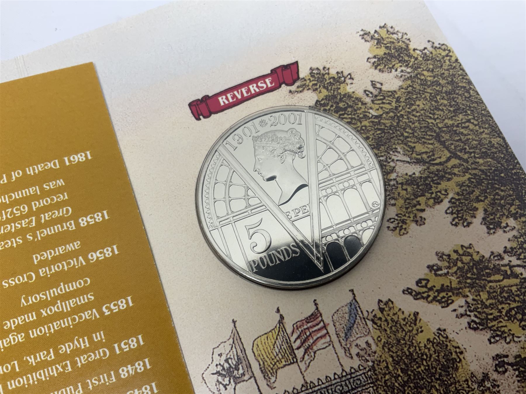 Eleven Queen Elizabeth II cupronickel five pound coins, in card folders or on cards