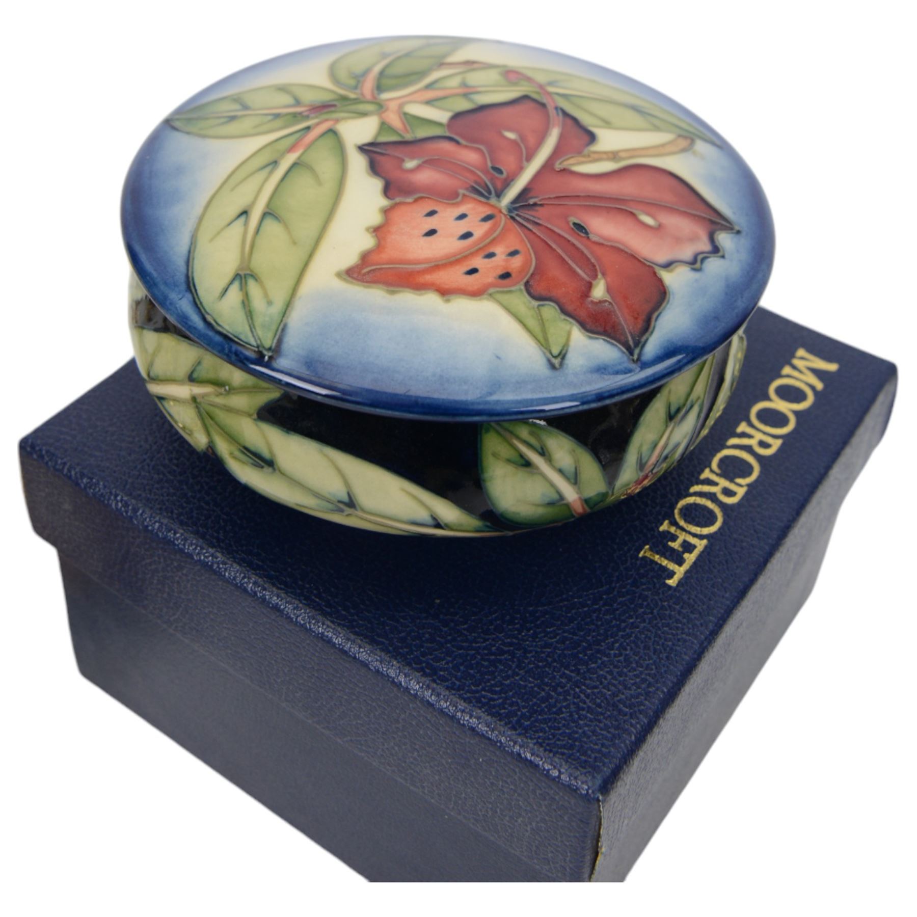 Moorcroft vase in Hypericum pattern, of baluster form, in original box, together with a Moorcroft covered dish in Simeon pattern, both with printed marks beneath, vase H10cm