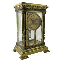 Lloyd Payne & Amiel - Parisian early 20th century four glass mantle clock c1905, with a Samuel Marti 8-day two train movement and twin file mercury pendulum, cast brass case with a flat top and dentil cornice beneath, decorative applied frieze supported by four tulip columns with capitals, conforming stepped plinth raised on pad feet with acanthus leaf motifs, gilt dial with a decorative and pierced centre, Arabic numerals within circular cartouche, steel fleur di Lis hands and embossed bezel, rack striking movement, striking the hours and half hours on a coiled gong.
Lloyd Payne and Amiel are recorded as retailers of quality clocks and barometers in Manchester c1890.
