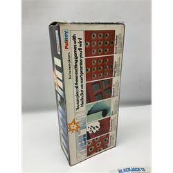 Three late 70s/early 80s handheld electronic games; Bandai Electronics Arcade ‘Gunfighter’ (1980), Grandstand ‘Invader From Space’ (1980), Palitoy ‘Merlin The Electronic Game Machine’ (1979) with game sheet and instruction booklet, all with original boxes (3) 