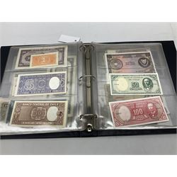 World banknotes, including Queen Elizabeth II The States of Jersey one pound 'DB202703', five pounds 'BB527762' and ten pounds 'AB651481', reserve bank of New Zealand two dollars '1L3 741894', King George V Straits Settlements one dollar 1st January 1935 'F/83 28924', various Bank of England notes etc, housed in two ring binder albums