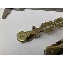 Two Victorian brass sovereign scales, one marked 'Harrison' L10cm; cased set of drawing instruments by G. Thornton Limited Manchester; Chesterman No.770/1 steel vernier caliper; two boxwood rulers; cased slide rule; brass and boxwood rope/wire gauge etc
