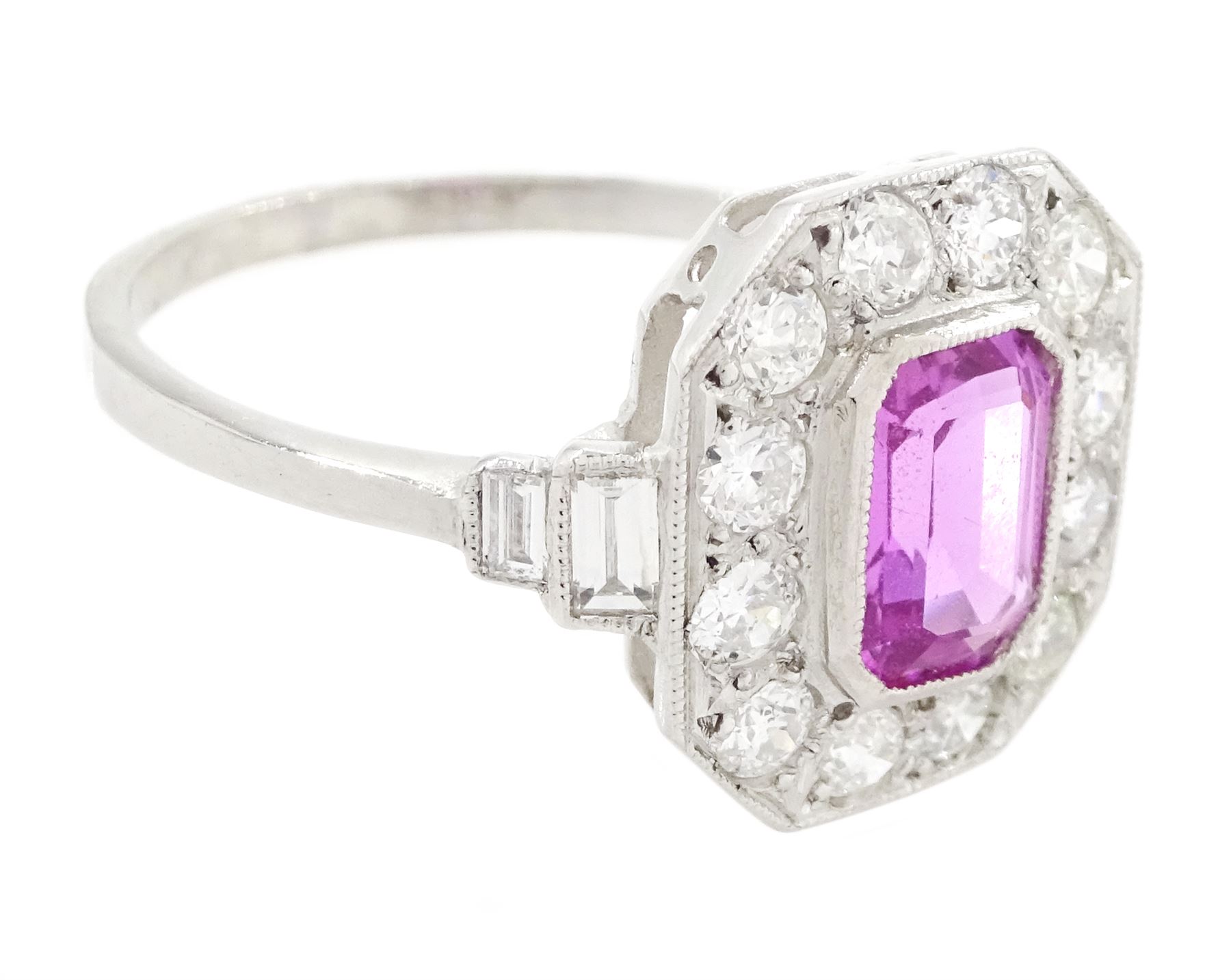 Platinum pink sapphire and diamond milgrain set cluster ring, single octagonal cut sapphire of approx 0.95 carat, surrounded by twelve old cut diamonds, with baguette cut diamond shoulders, stamped Plat, total diamond weight approx 0.70 carat