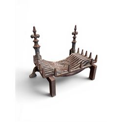 Victorian design cast iron fire grate with fire dogs, final over floral moulding and trefoil base