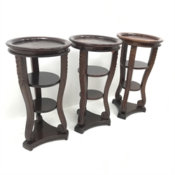 Three Classical style mahogany lamp tables, three carved shaped supports joined by two solid undertiers, D45cm, H83cm 
