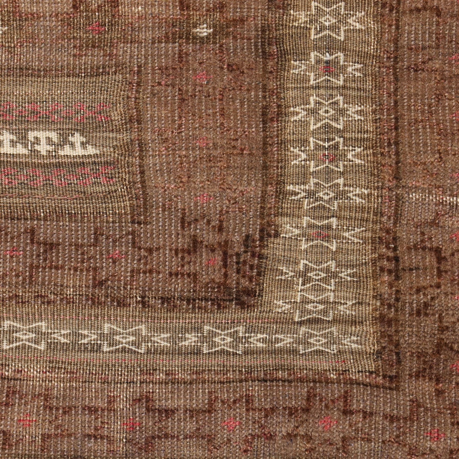 Tekke Turkman rug, madder red field decorated with repeating rows of octagonal guls, framed by multiple geometric borders, 86x133cm and an Anatolian flatweave kilim, 95x140cm, (2)