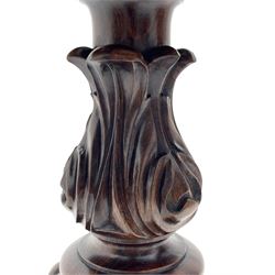 Victorian rosewood rise and fall piano stool, the floral needlework upholstered seat raised on floral and scroll carved tripod base