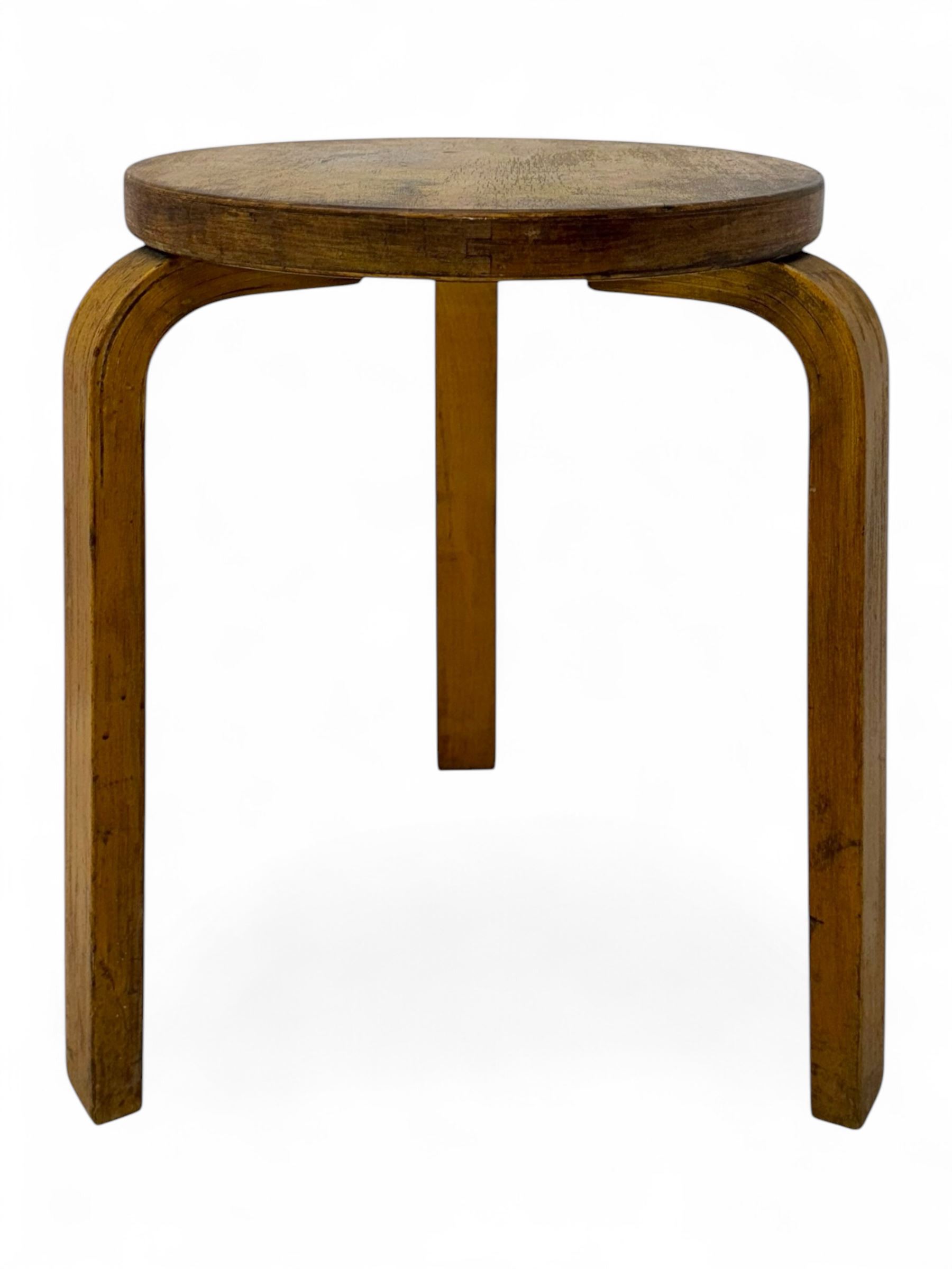 Alvar Aalto for Finmar - mid-20th century Finnish birch circular stool, the seat supported by three bentwood supports, applied label to the underside 