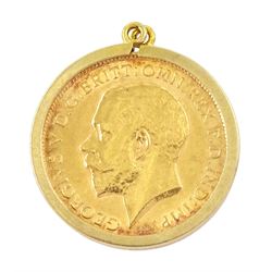 George V 1911 gold half sovereign coin, loose mounted in 9ct gold pendant