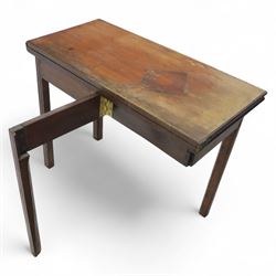 Georgian mahogany fold-over tea table, rectangular top with moulded edge over single frieze drawer with brass handle plate, on square tapering supports with gateleg