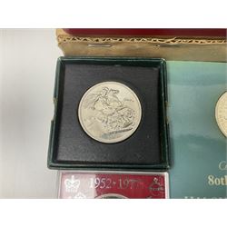 Coins including two King George VI 1951 Festival of Britain crowns each in green case, various other commemorative crowns, two Iceland '874-1974' two coin sets both in original red cases etc