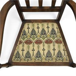 Robson & Sons, Newcastle on Tyne - Arts & Crafts high back armchair, upholstered in Mackintosh style fabric, shaped armrests and cylindrical supports united by stretchers