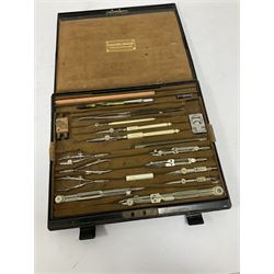 Victorian drawing instrument set by Drawing Office Supplies Ltd, housed in a black metal case, the interior containing various drawing instruments
