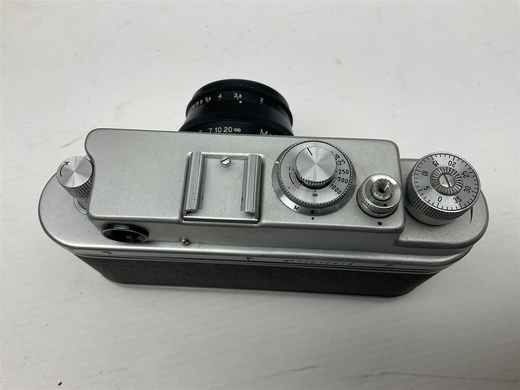 Zorki-4K camera body, serial no 74334713 with 'Jupiter-8 2/50' lens serial no 7454365, Zorki-4 camera body serial no 71012418 with 'Jupiter-8 2/50' lens serial no 0174594, and three other cameras 