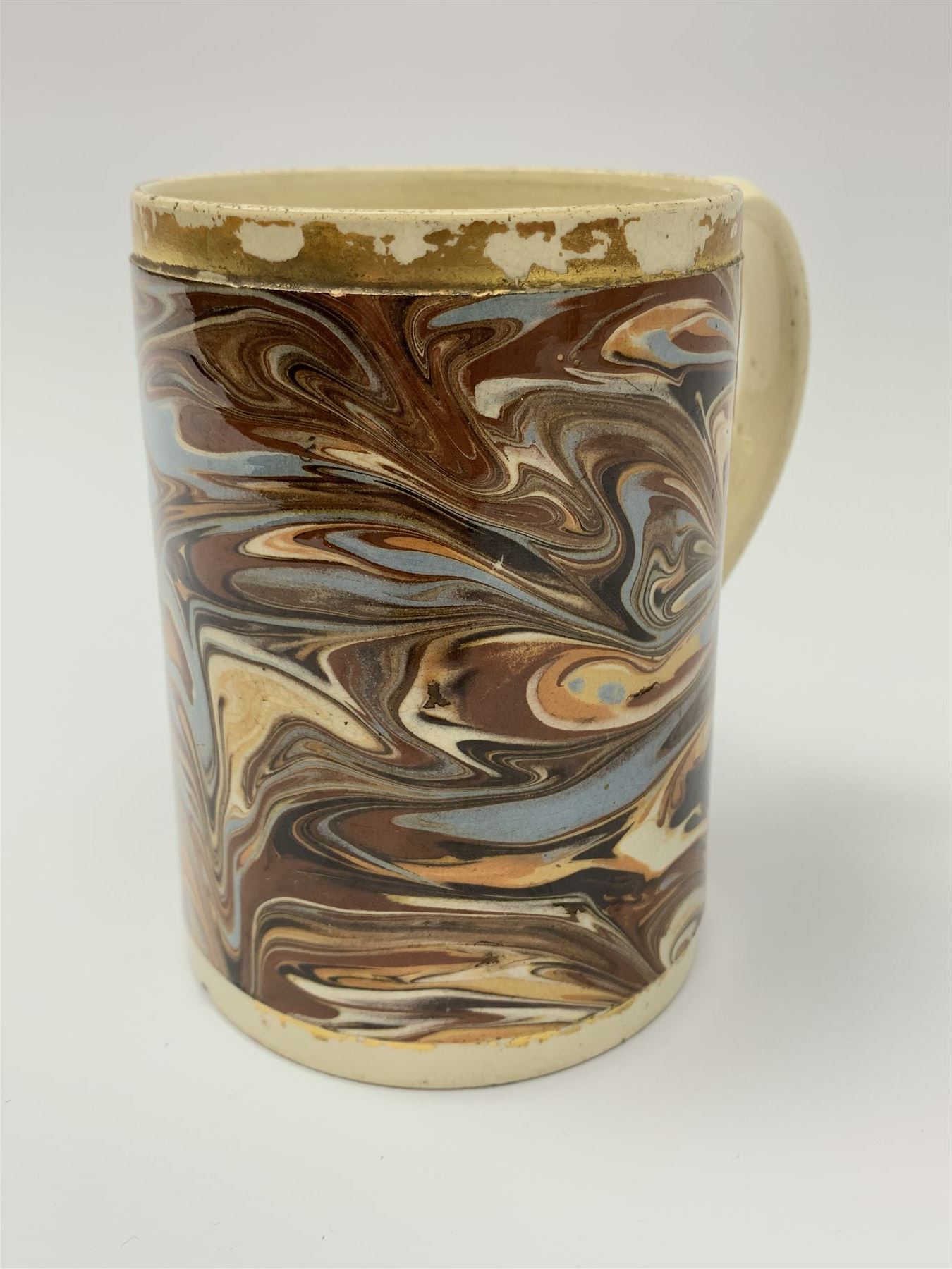 Late 18th century earthenware mug, possibly Ralph Wedgwood, Burslem or Ferrybridge, with surface marbled decoration and later gilt detail to rims and handle, impressed beneath Wedgwood & Co, H12cm
