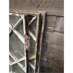 Four 19th century cast iron windows, lattice glazed in white painted finish, 