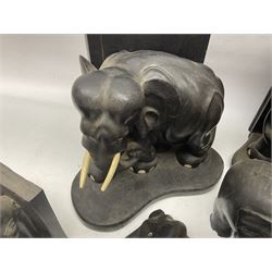 Three pairs of carved wooden elephant bookends, and a similar carved wooden elephant figure, tallest H24cm