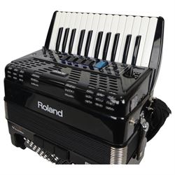  Roland FR-1X piano accordion (uncased)13 fold bellows two octave keyboard with 26 keys, 72 buttons, classic, jazz,ensemble, brass, wind, piano, and guitar samples. With a Roland BK-7m Backing Module, leads and tutorials.