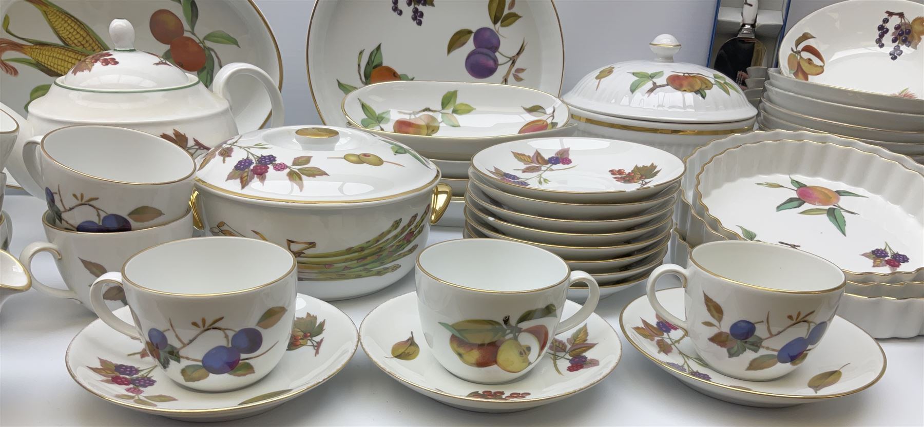 Royal Worcester Evesham pattern dinner and tea wares, comprising five tureens, seven coffee cup, ten tea cups and saucers, coffee pot, jug and various serving bowls etc, along with Royal Worcester Pastorale pattern tea ware, including ten cups and saucers, ten side plates etc.  .