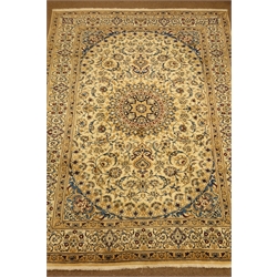  Fine Persian Nain ivory ground carpet, central medallion with scroll decorated field, 345cm x 246cm  