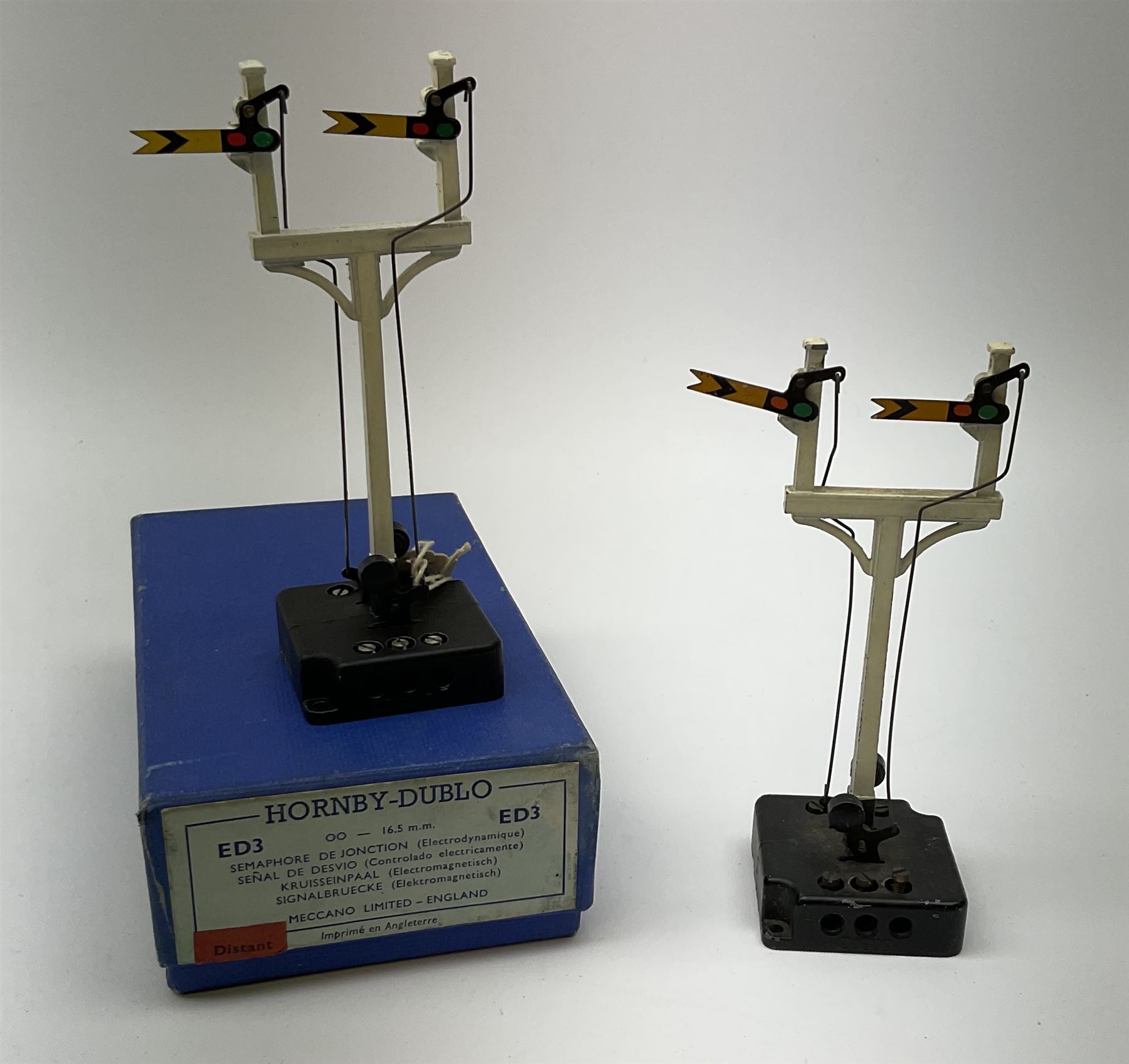 Hornby Dublo - fifteen electric semaphore signals comprising three ED1 Single Arm; two ED2 Double Arm; one ED3 Junction Signal Upper Quadrant; two ES6 Colour Light Signal - Single (Home); and three Colour Light Signal - Junction (Home); all boxed; together with four unboxed electric signals (15)