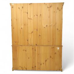 20th century painted pine dresser, moulded cornice above shaped frieze and two open plate shelves, central row of five small drawers with wooden knobs, base fitted with three drawers over a pair of panelled cupboard doors, on shaped plinth base