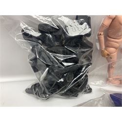 Action Man - large collection of 1960s and later figures and accessories including Spaceman with ATLRV vehicle; two figures marked 'Made in England by Palitoy under licence from Hasbro 1964'; twenty-five assorted weapons; radio backpacks; kit bags; twenty-one pairs of boots; football boots and snow shoes; metal diver's boots and three pairs of flippers; two pairs of jackboots; roller skates; various tunics, trousers, flying suits, jumpers, belts etc; twenty helmets, berets, busby, kepis, submariner etc; and quantity of other accessories