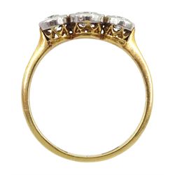 Art Deco milgrain set three stone diamond ring, stamped 18, the inside inscribed 'Amor Vincit Omnia' and dated 10.9.25, total diamond weight approx 0.55 carat