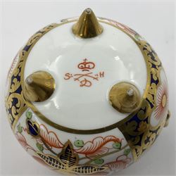 Group of Crown Derby and Royal Crown Derby Imari pattern miniatures, including mid 19th century Stevenson and Hancock cauldron, with painted mark beneath, H5.5cm, a near pair of early Royal Crown Derby scuttles, decorated in the 6299 pattern, each with printed and painted marks beneath including illustration date codes for 1913 and 1922, tallest 6.5cm, and a further early 20th century Royal Crown Derby scuttle, decorated in the 6299 pattern, with printed and painted marks beneath including illustration date code for 1922, H5.5cm, (4)
