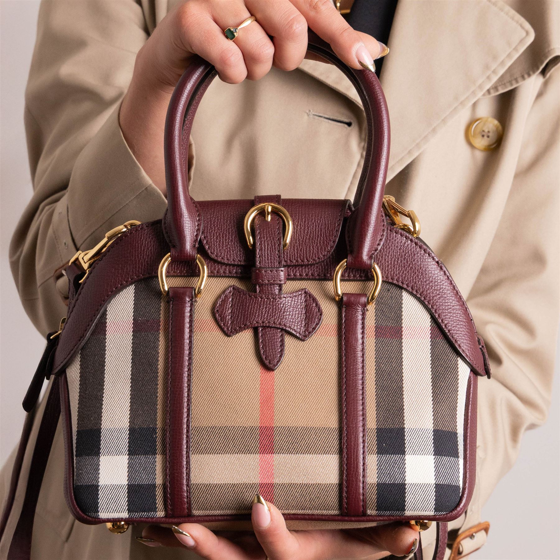 Burberry - ‘Milverton’ Small House Check Bag, introduced circa 2015 under Christopher Bailey, in signature Haymarket check canvas with oxblood grained leather trim and belted front detail, with rolled top handles and detachable shoulder or crossbody strap, with gold-tone hardware, unused with original dust bag