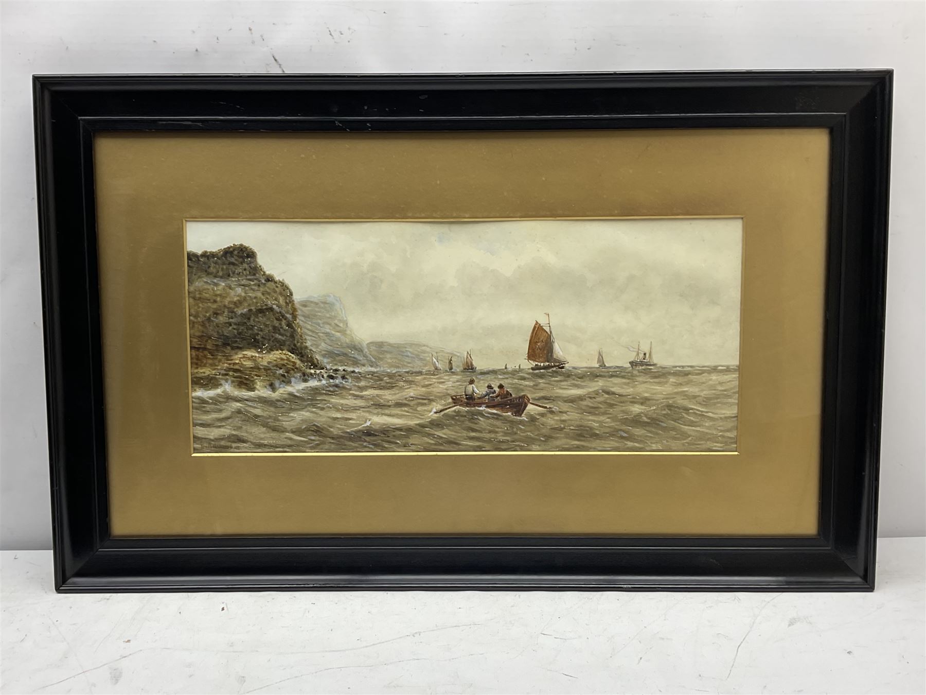 E Adams (British 19th/20th century): Scarborough Fishing Boats off the Yorkshire Coast, watercolour indistinctly signed 23cm x 54cm