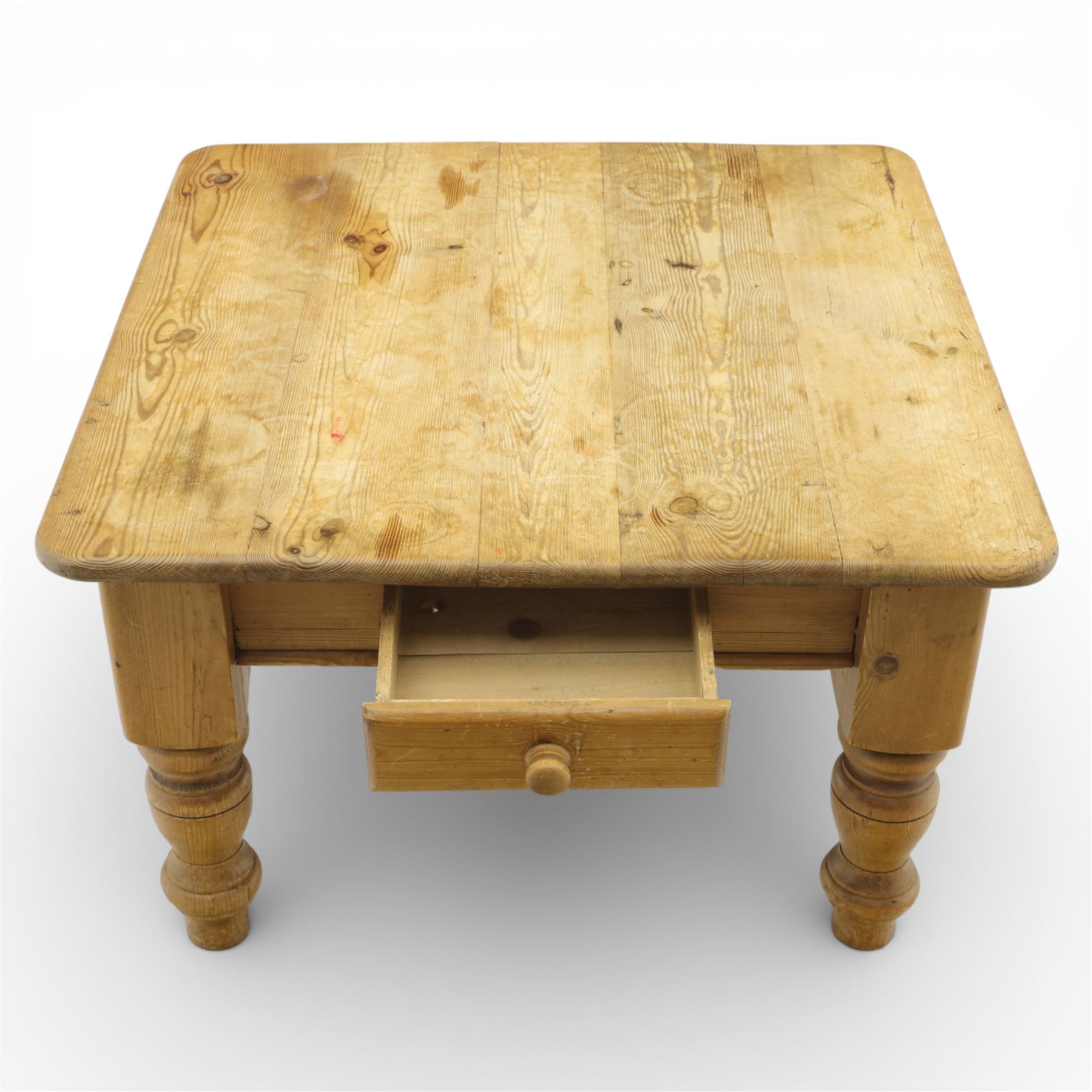 20th century stripped pine coffee table, square top over two frieze drawers, raised on block and turned supports