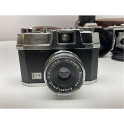 Canon EOS 50e camera body, serial no 8305671 with 'Canon Zoom EF 35-135mm 1:4-5.6' lens together with Halina 35X super camera body, with 'Halina Anastigmat f.c. 1:3.5 f=45mm' lens and other camera equipment 